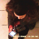 A hidden ceiling camera records an unsuspecting girl as she texts on her iPhone while taking a piss and shit sitting on a toilet in a public restroom. Background noise makes pooping difficult to hear, but product is visible in toilet. About 1.5 minutes.